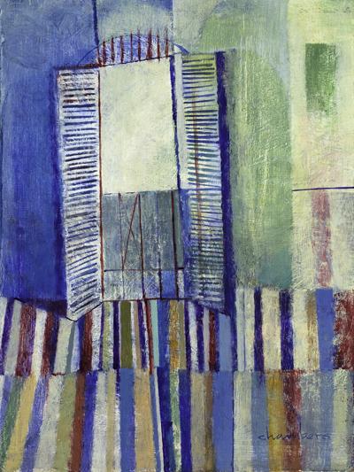 Interior of an artist's studio overlooking a balcony as seen through open shutters